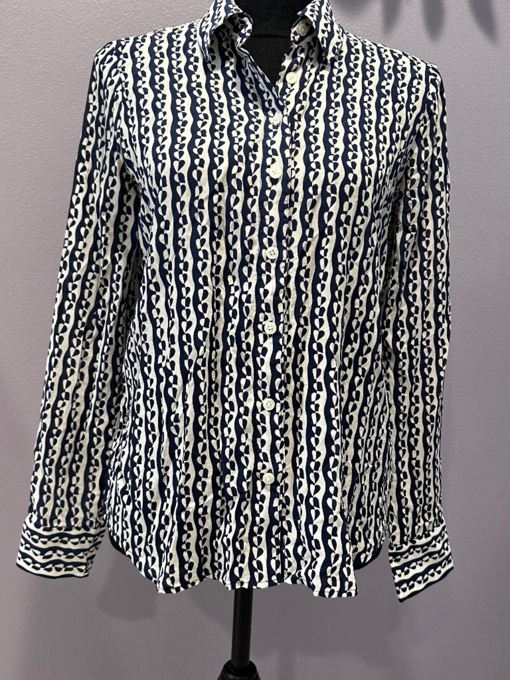 Boden navy and white geometric button down blouse.